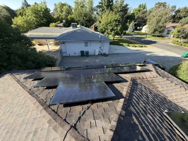The same rooftop panels after cleaning, dark and clear